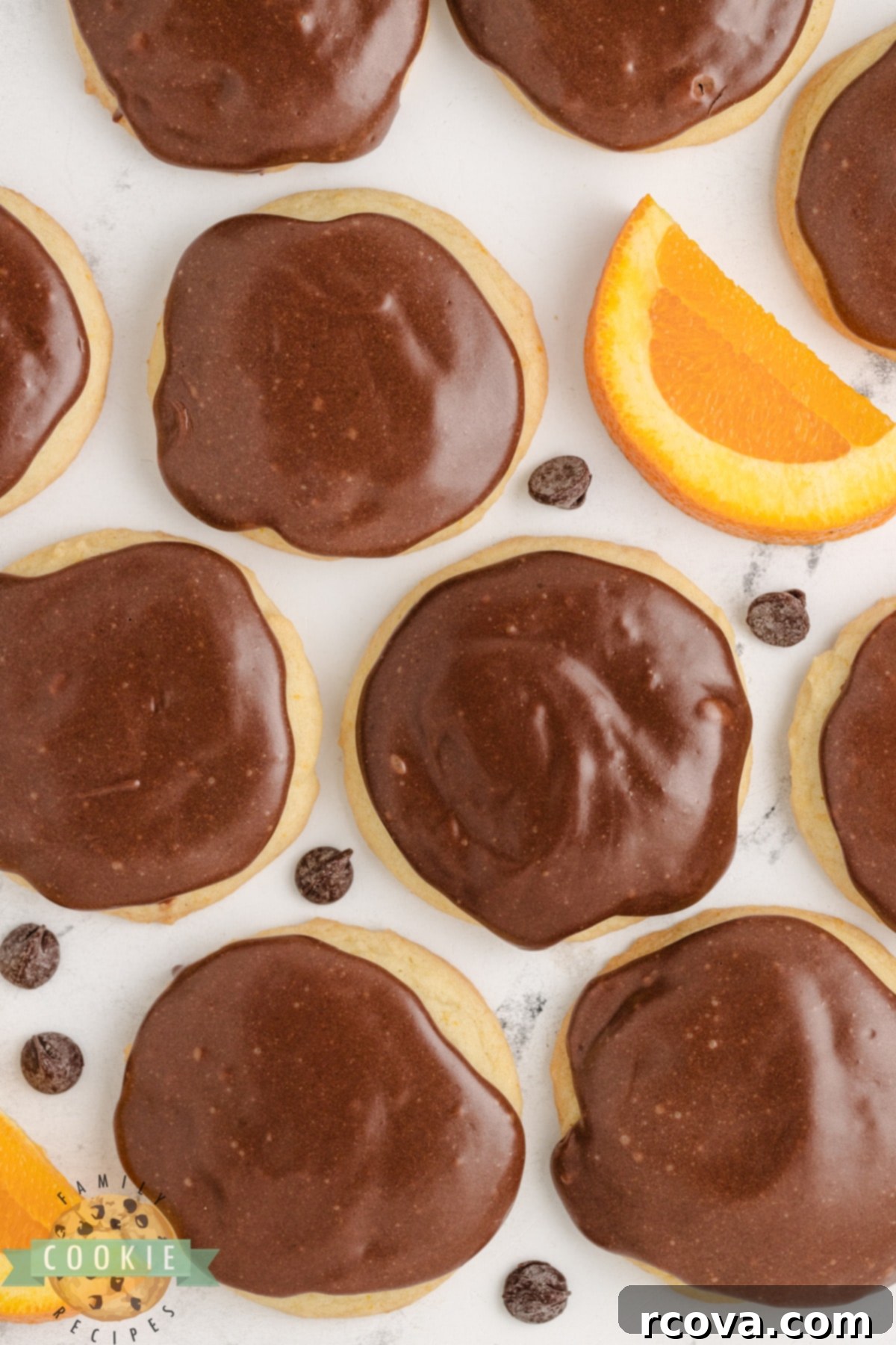 Decadent Orange Fudge Cookies 3 Orange cookies with fudge topping, showcasing the vibrant orange and rich chocolate combination.