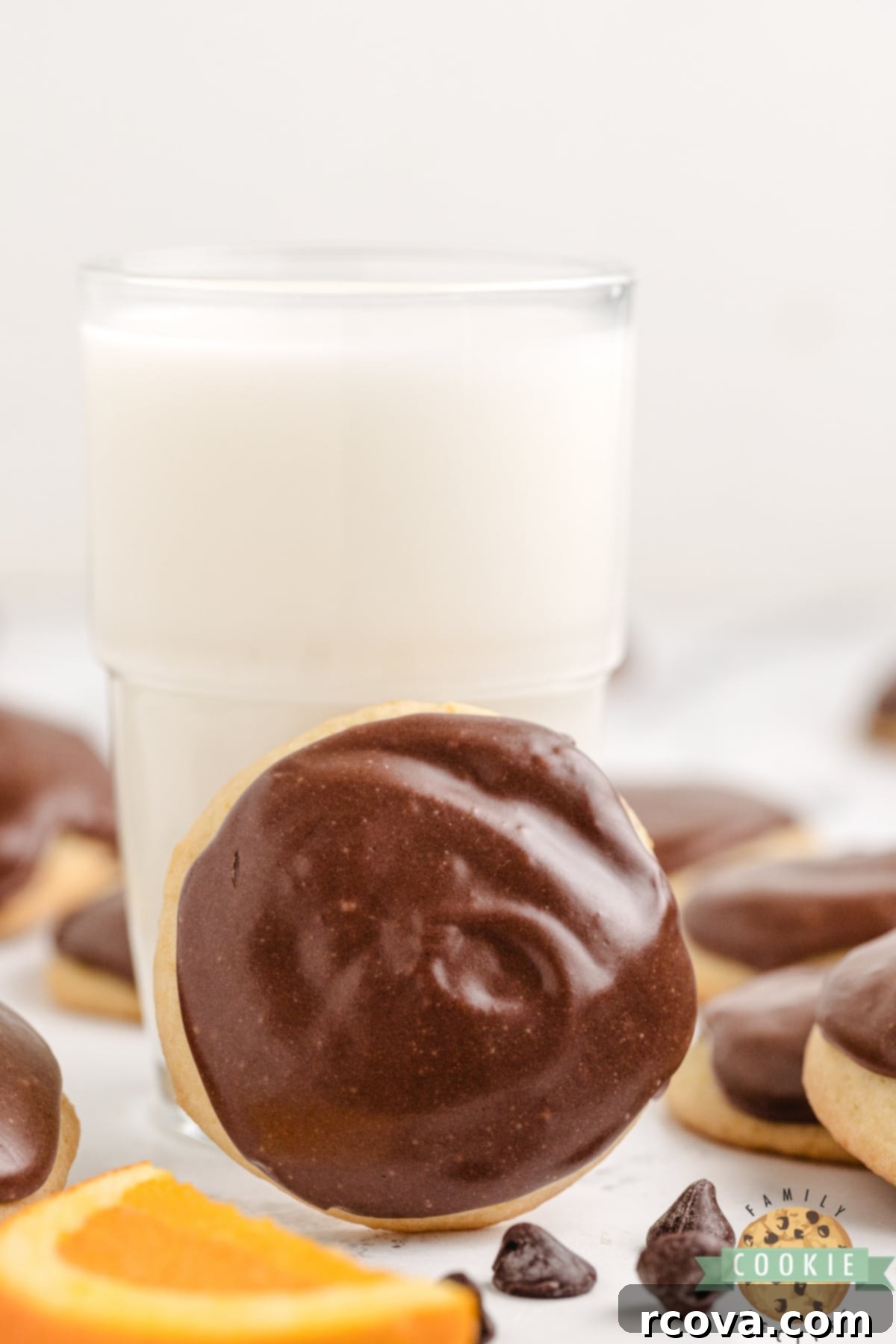 Decadent Orange Fudge Cookies 5 Baked orange cookies with the smooth, glossy chocolate fudge topping applied.