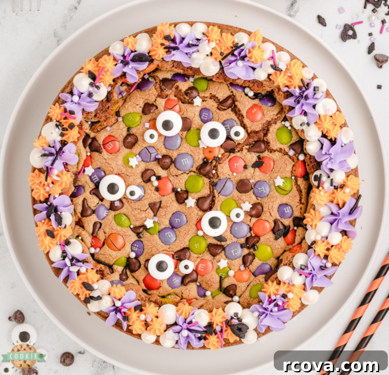 Spooky Cookie Cake 3 Halloween cookie pie with frosting and sprinkles on top