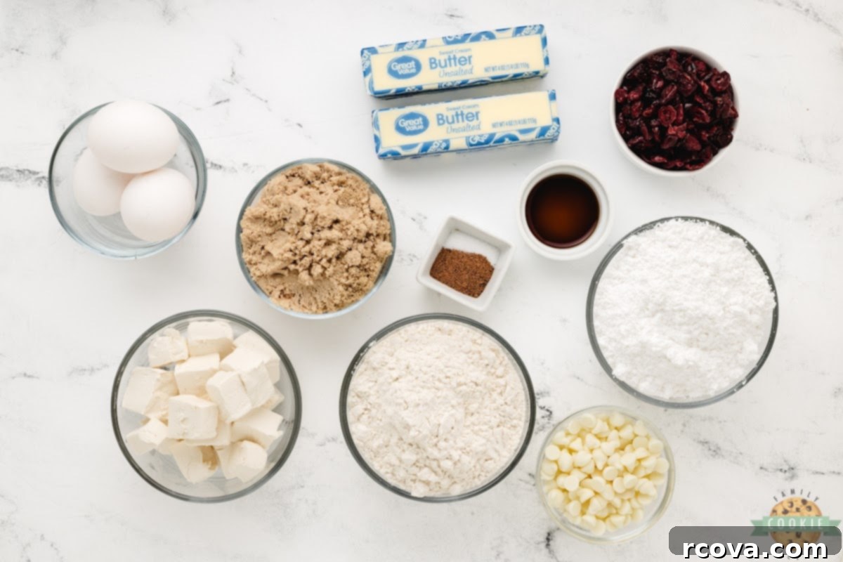Irresistible White Chocolate Cranberry Cookie Bars 4 A collection of fresh ingredients laid out for making White Chocolate Cranberry Cookie Bars, highlighting quality and readiness.