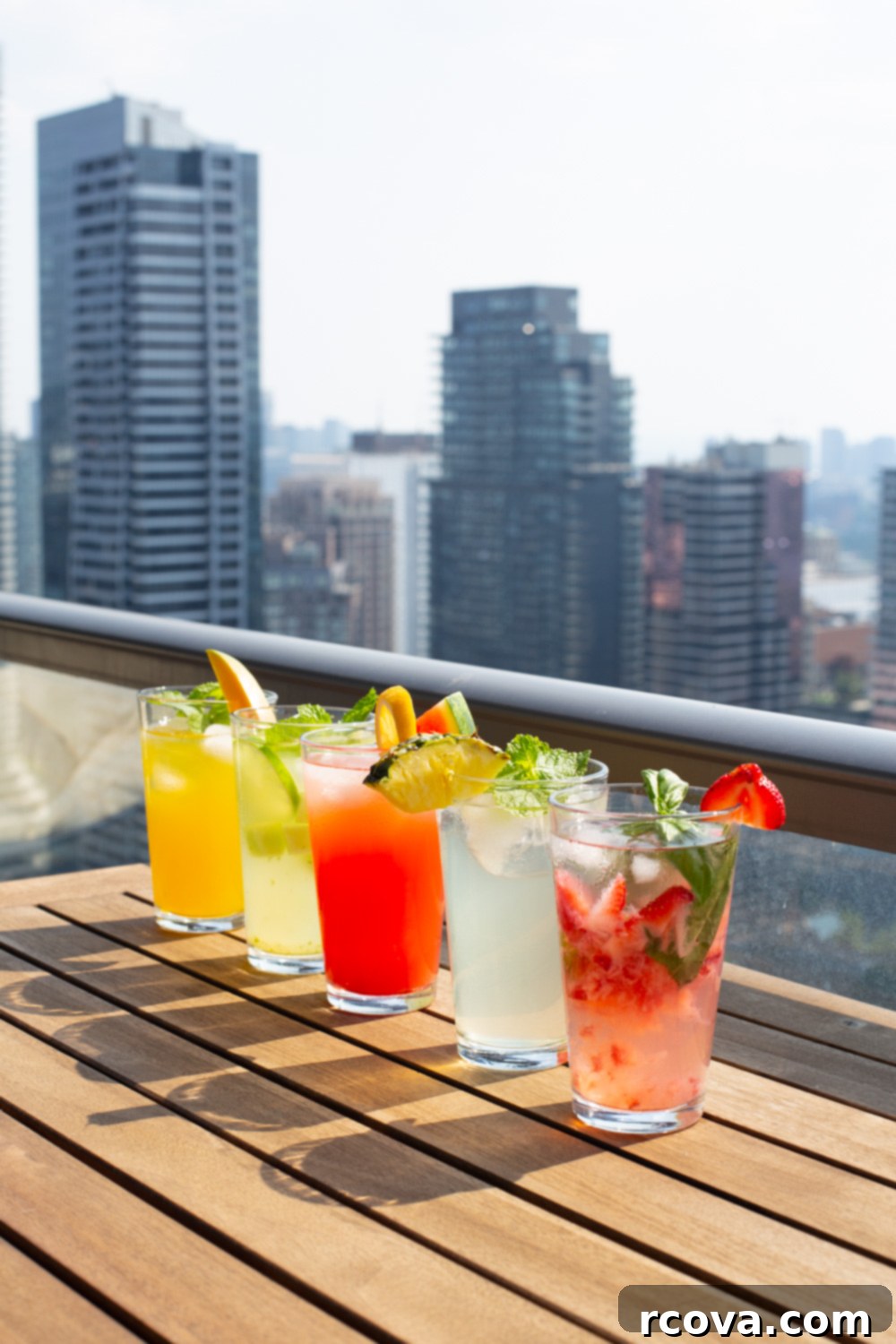 Summer's Coolest Sips 10 A refreshing spread of summer mocktails, perfect for a picnic or party.