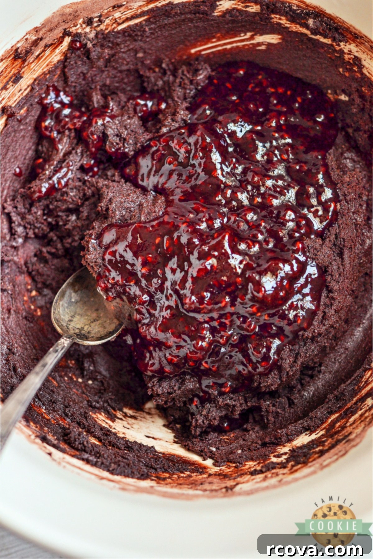 Decadent Raspberry Chocolate Crinkle Cookies 8 Add raspberry preserves to the chocolate cookie dough.