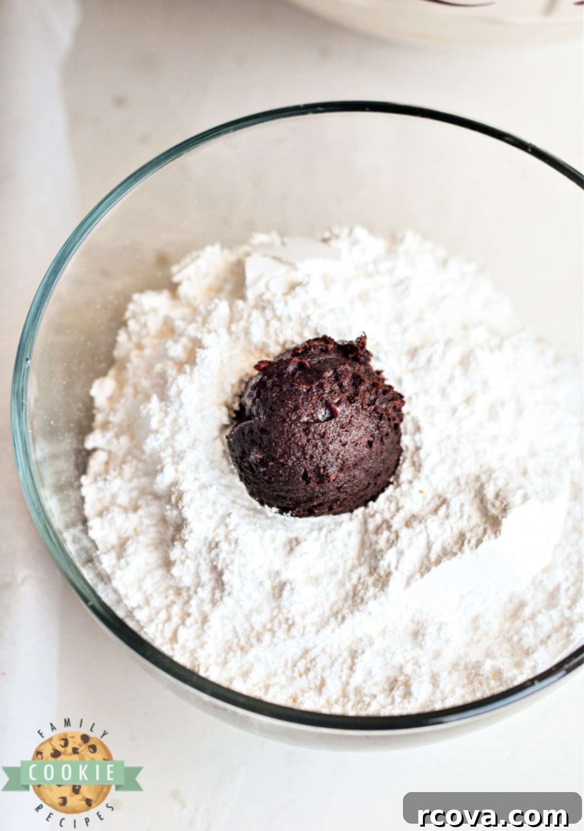 Decadent Raspberry Chocolate Crinkle Cookies 9 Roll each ball of dough in powdered sugar.