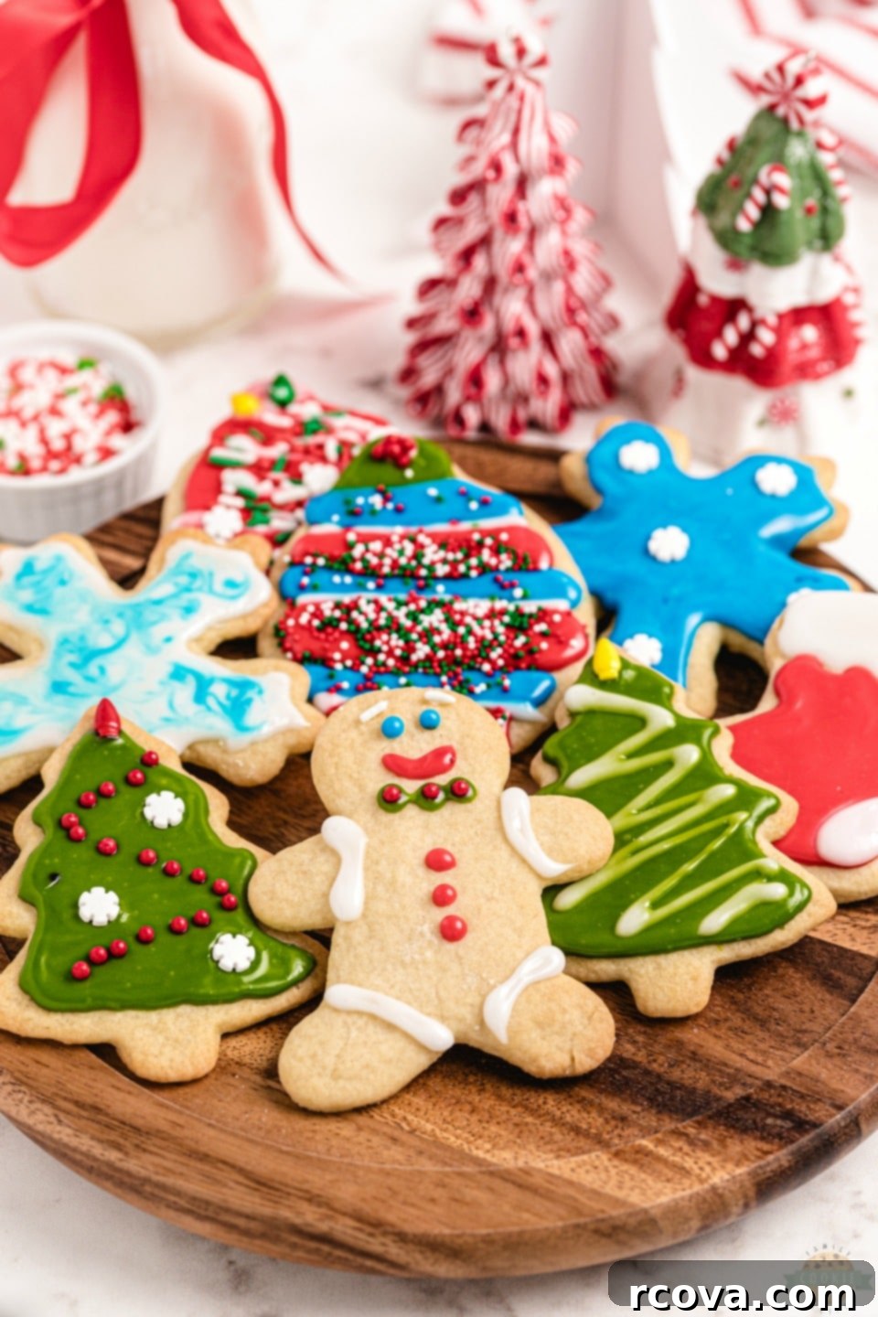 Crafting Christmas Cookie Magic 8 How to make Christmas Cut Out Cookies. A collection of un-iced Christmas tree and star shaped cookies on a wire rack.