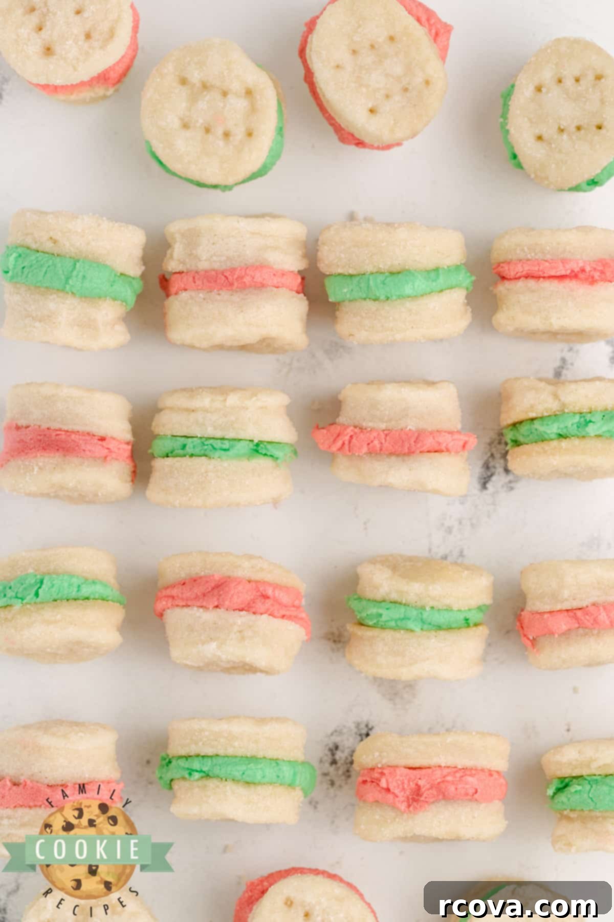 Sweet Little Christmas Cookie Sandwiches 15 Mini Christmas Sandwich Cookies are the perfect holiday treat! These tiny shortbread cookies with a simple buttercream frosting sandwiched in between are easy to make and fun to eat.
