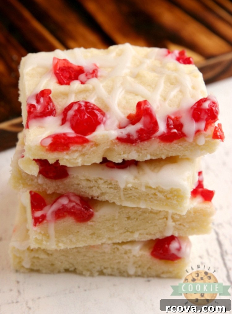 Almond Cherry Bliss Bars 2 Cherry Almond Cookie Bars are simple cookie bars that fall somewhere between a shortbread and a sugar cookie. This cookie bar recipe is packed with almond flavoring and topped with chopped maraschino cherries and a simple powdered sugar glaze.