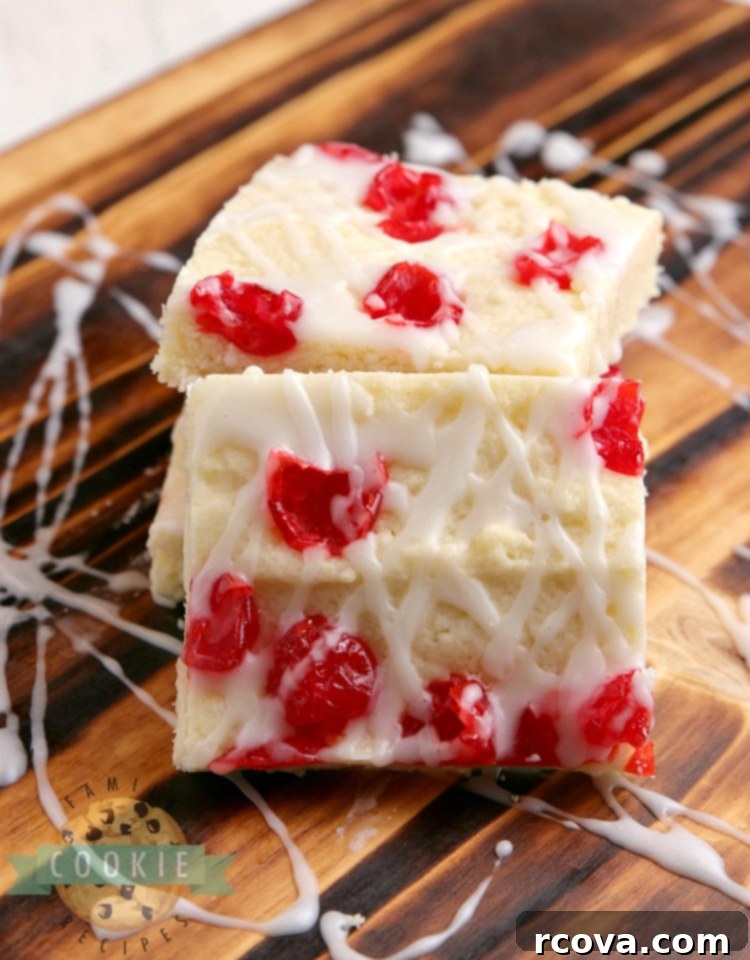 Almond Cherry Bliss Bars 6 Sugar cookie bars topped with cherries and glaze