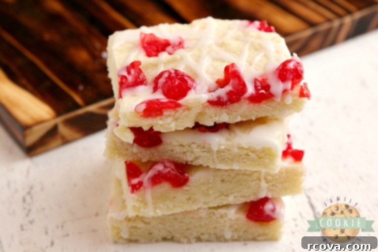 Almond Cherry Bliss Bars 7 Sugar cookie bars topped with cherries and glaze
