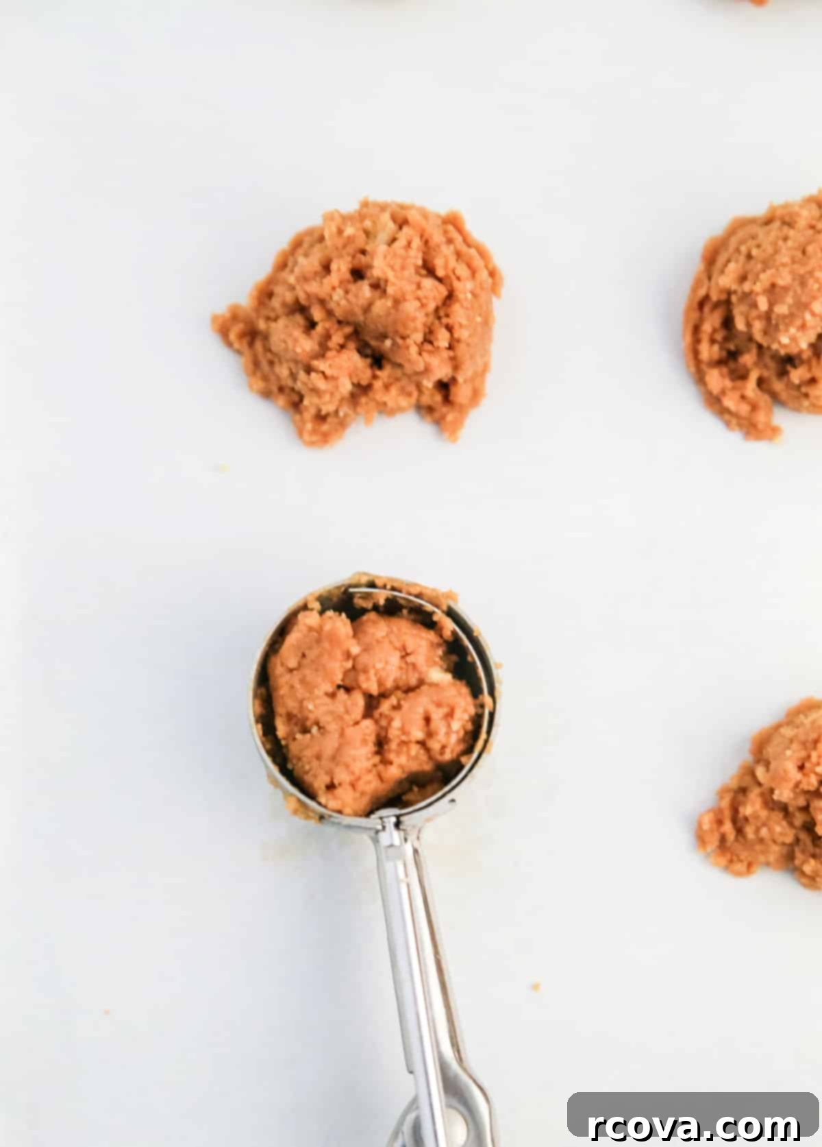 Rudolph's Cookie Butter Truffles 7 Scoop cookie butter mixture with cookie scoop.
