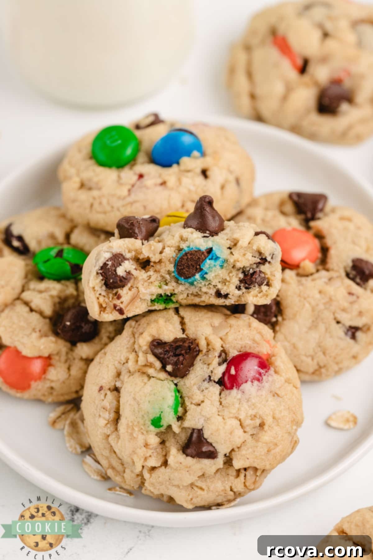 Easy 5-Ingredient Monster Cookies 12 A pile of easy peanut butter cookies featuring oats, chocolate chips, and M&Ms, ready for serving.