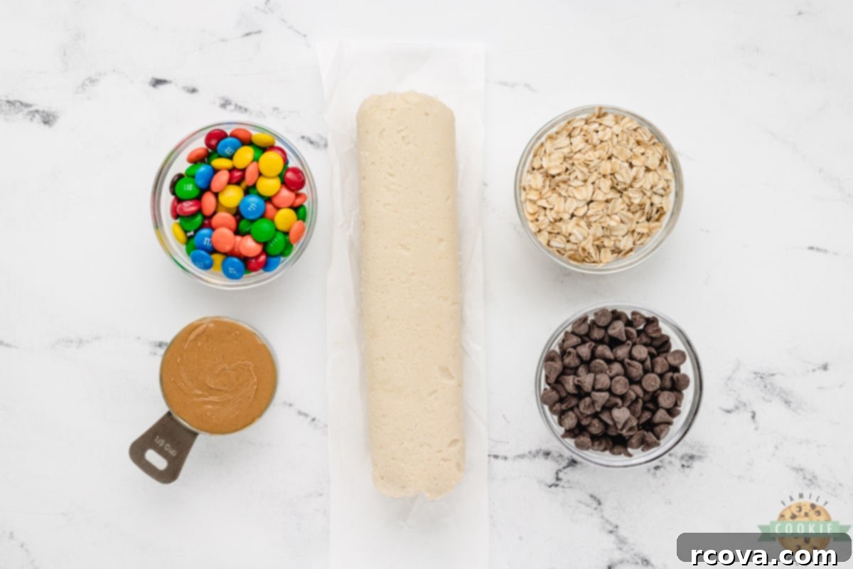 Easy 5-Ingredient Monster Cookies 4 A selection of the five simple ingredients for Monster Cookies: cookie dough, peanut butter, chocolate chips, M&Ms, and oats.