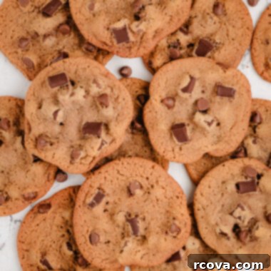 Signature Malted Chocolate Chip Cookies 4 Tray of freshly baked malted chocolate chip cookies cooling on a rack