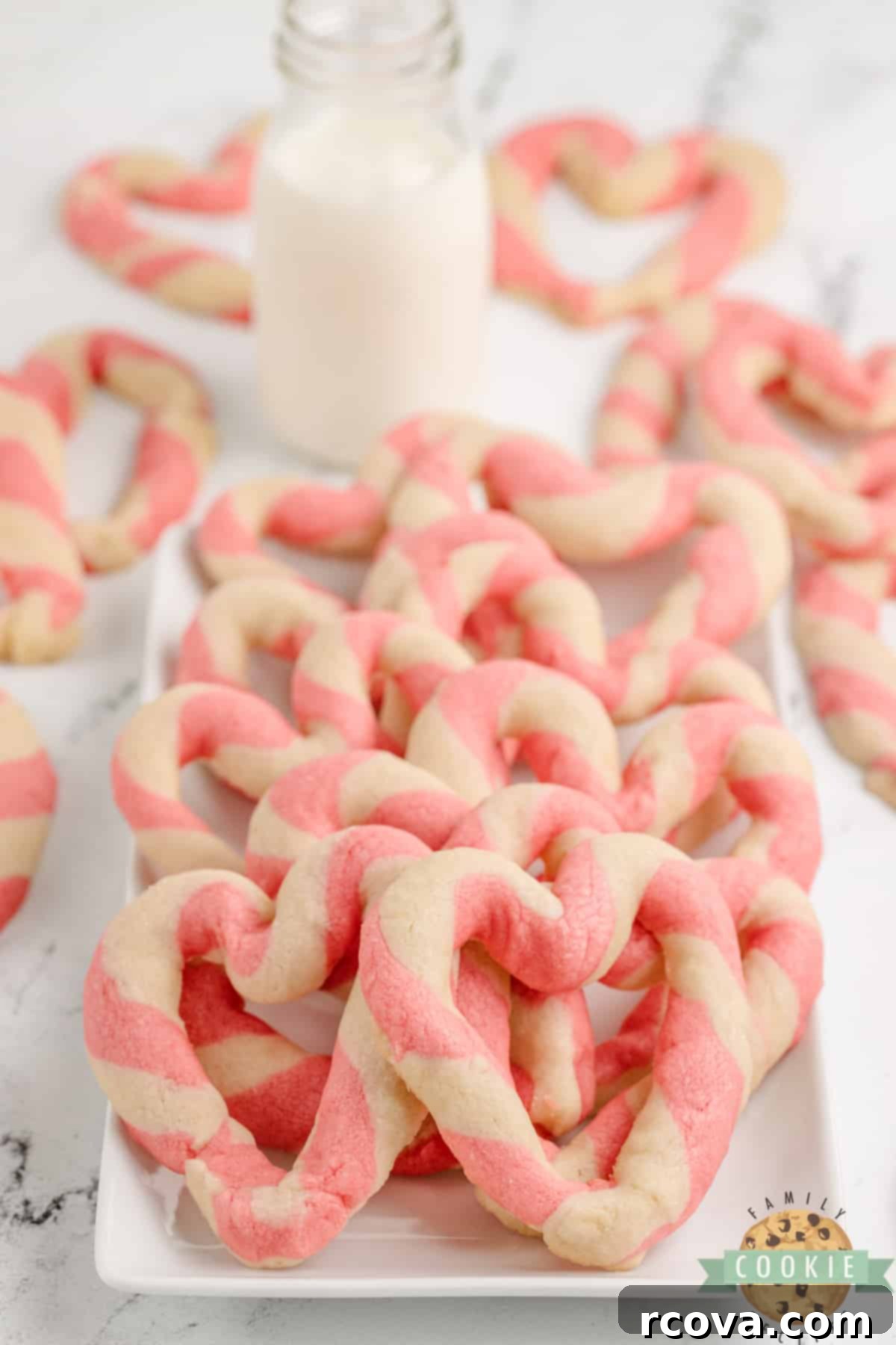 Braided Love Cookies 12 Braided Sweetheart Cookies are simple sugar cookies formed into pink and white striped hearts. These heart-shaped cookies are easy to make and are so pretty, you don't even need frosting!