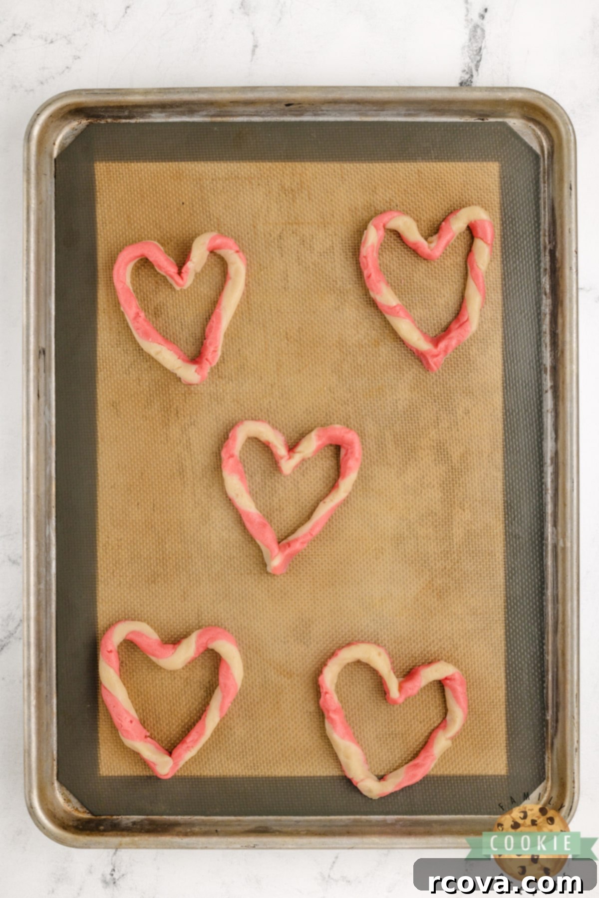 Braided Love Cookies 9 Pink and white dough twisted into a heart shape.