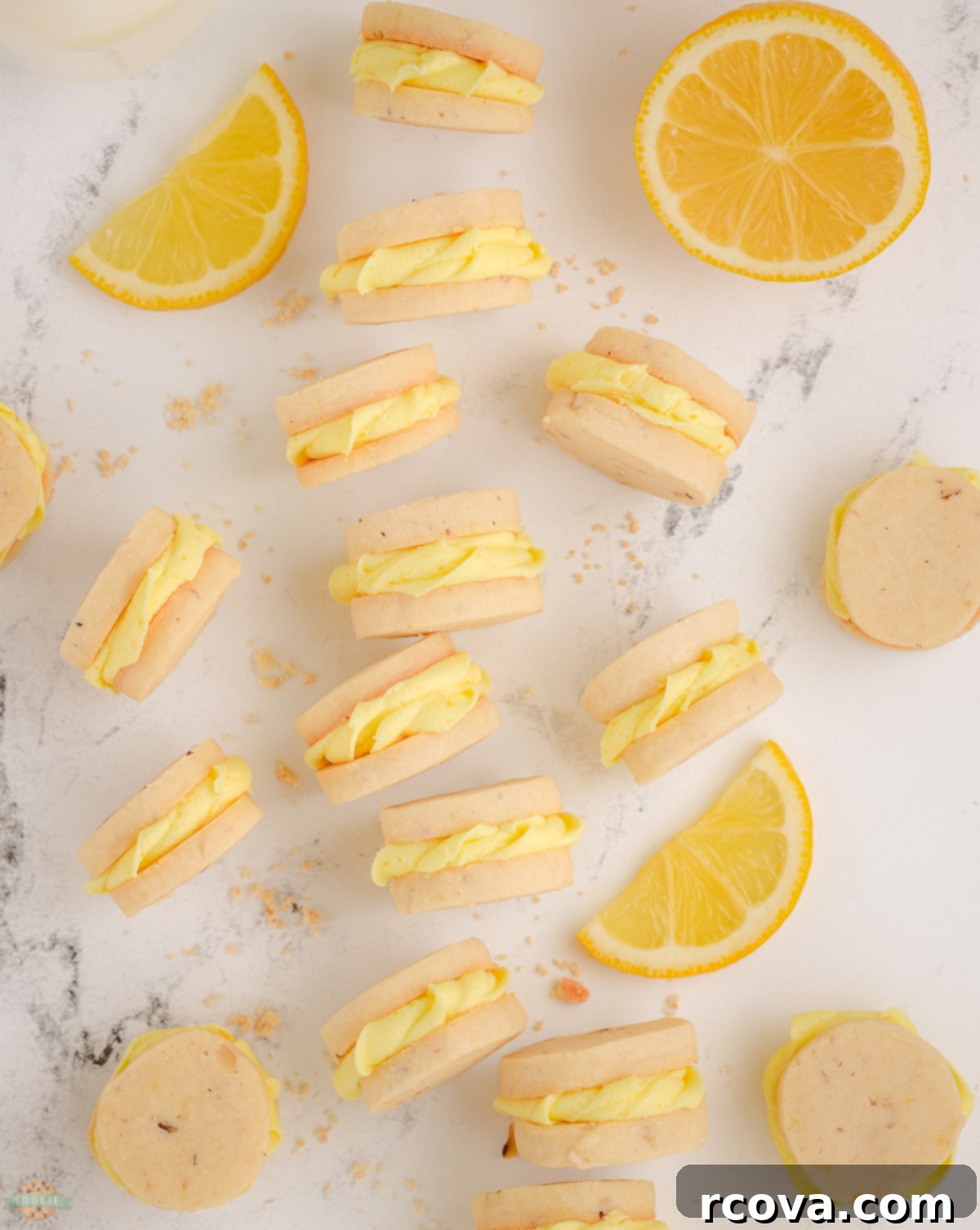 Lemon Creme Clouds 2 lemon sandwich cookies with lemon frosting piped in the middle