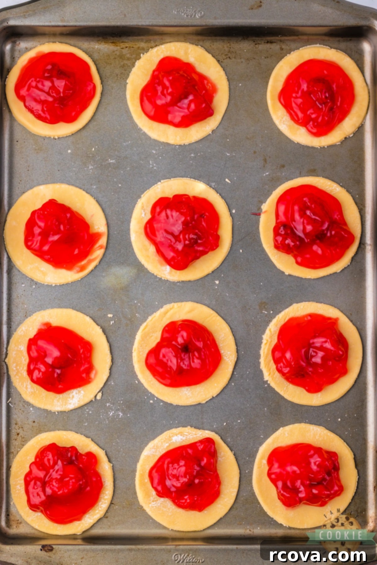 Strawberry Pie-Inspired Cookies 6 Add strawberry pie filling to the pie crust circles.