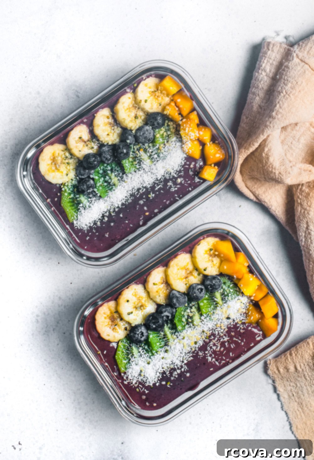 Your Ultimate Guide to Perfect Acai Bowls 9 Easiest Healthy Acai Bowl Recipe - a person holding a freshly made acai bowl