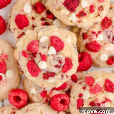 Cheesecake-Filled Raspberry Cookies 5 tray full of raspberry cheesecake cookies