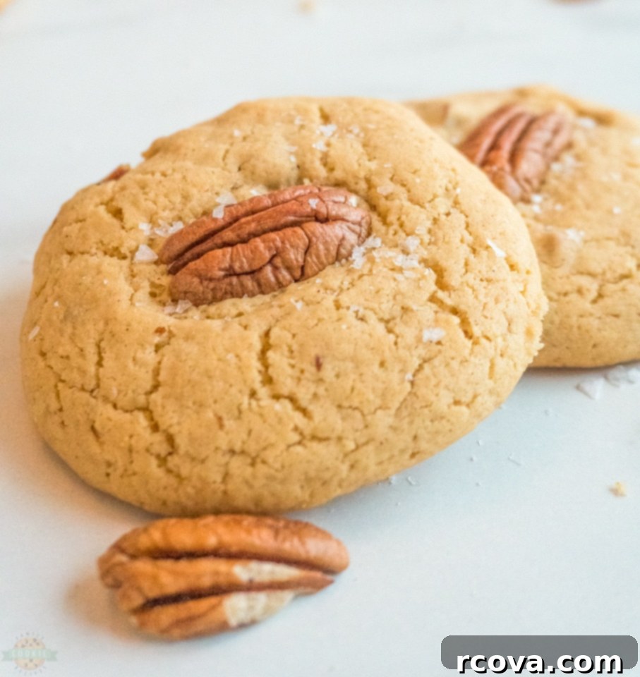 Buttery Pecan Perfection 9 A warm, inviting plate of Butter Pecan Cookies, perfectly golden brown.