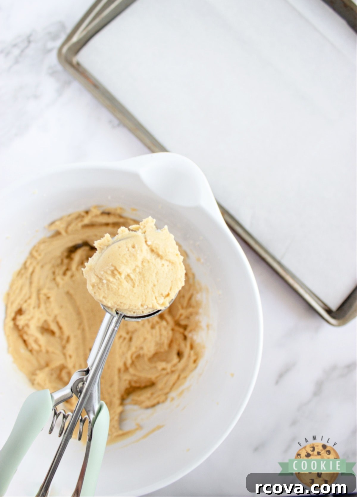 Pillowy Tiramisu Delights 8 Scoop the cookie dough onto a baking sheet, ready for baking.