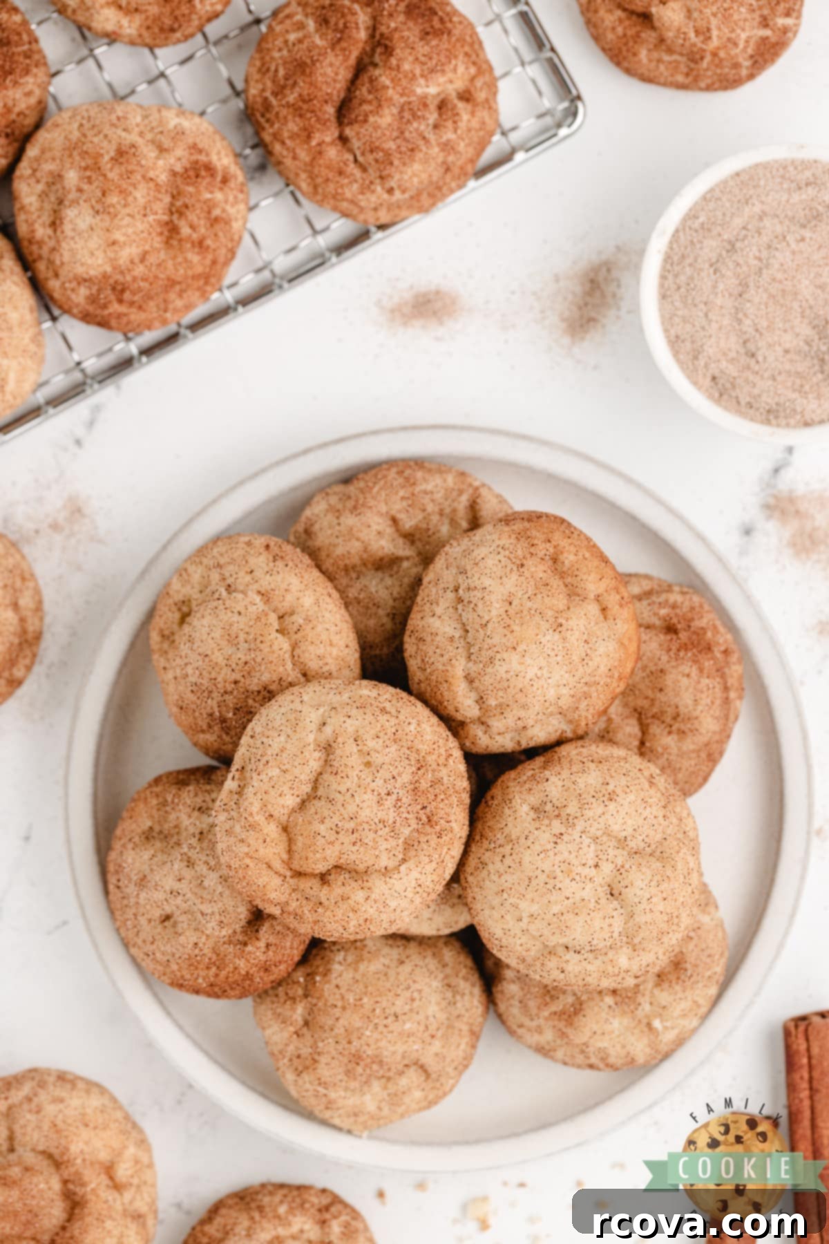 Creamy Snickerdoodle Delights 10 A serving platter filled with freshly baked cream cheese snickerdoodle cookies, ready to be enjoyed.