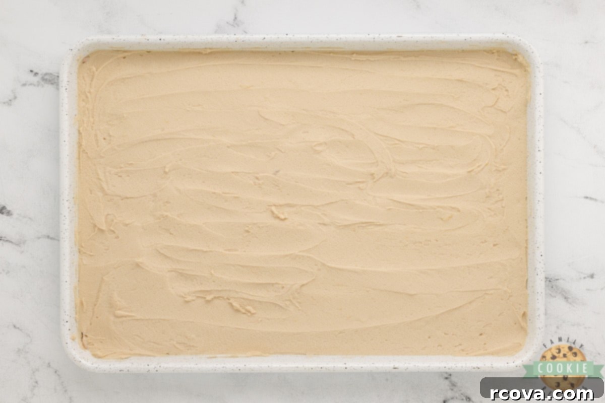 Irresistible Snickerdoodle Cookie Bars 12 Spread snickerdoodle dough in a baking pan.