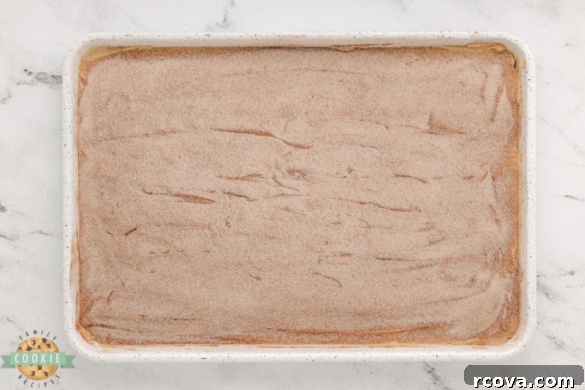 Irresistible Snickerdoodle Cookie Bars 13 Add cinnamon sugar topping to the cookie bars before baking.