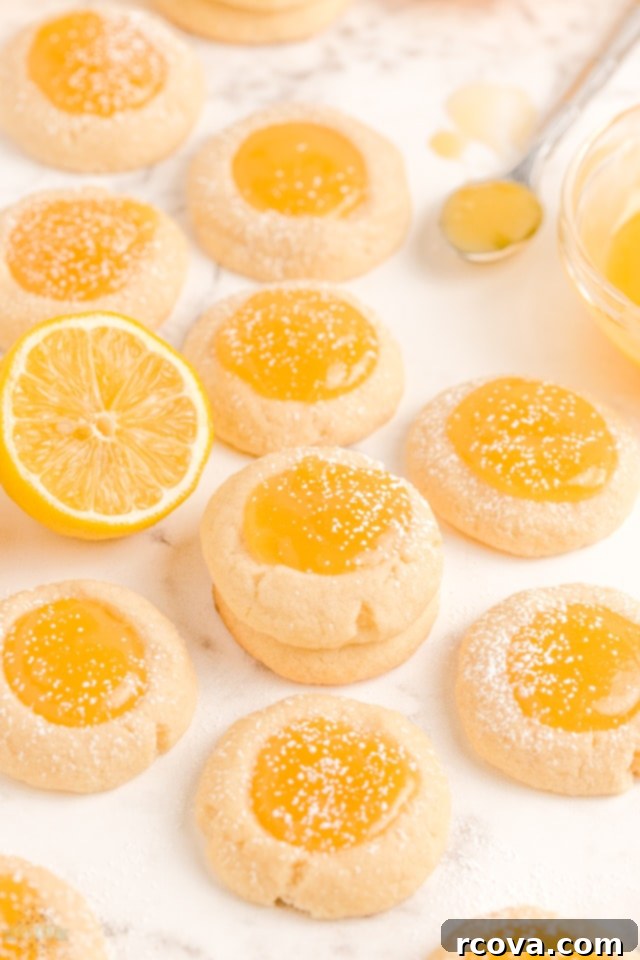 Zesty Lemon Thumbprint Delights 6 Forming 1-inch balls of cookie dough for Lemon Thumbprint Cookies.