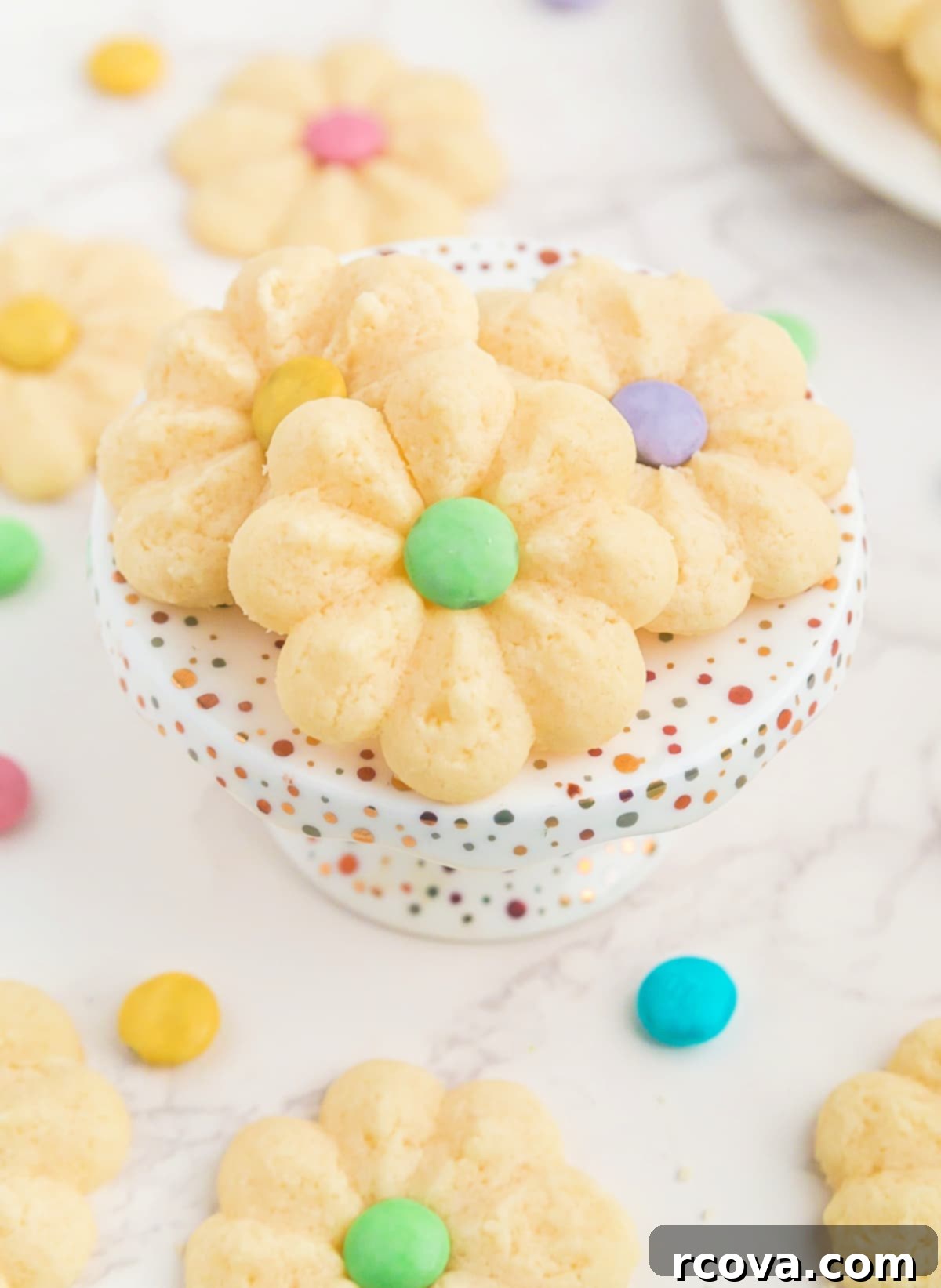 Buttery Spring Spritz Delights 8 A lovely assortment of Spring Spritz Cookies on a serving platter, perfect for a festive spring treat.