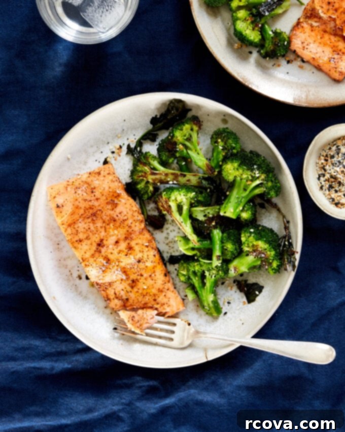 Healthy 5-Ingredient Meals for Breakfast Lunch and Dinner 27 A vibrant sheet pan of Baked Salmon With “Everything” Broccoli, perfectly roasted and seasoned, offering a healthy and flavorful dinner option.