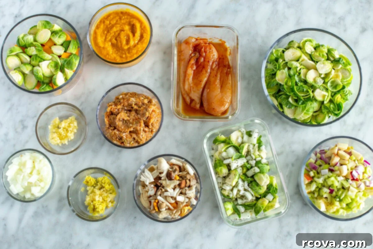 Smart Food Storage: Keeping Your Produce Fresh with the Right Containers 7 Various prepped ingredients in clear glass containers and silicone bags, organized for meal prepping.