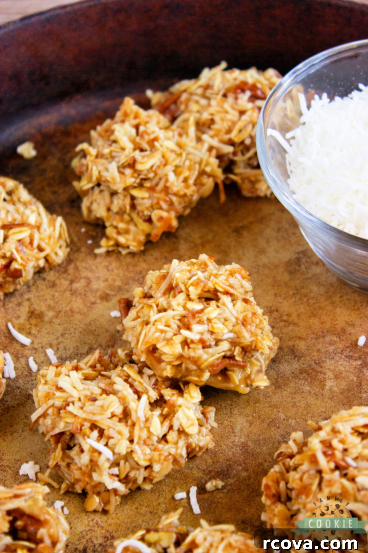 Golden Caramel Coconut No-Bake Delights 6 A vibrant display of Caramel Coconut No-Bake Cookies, highlighting their rich, golden color and enticing texture. Made with brown sugar, honey, cream, toasted shredded coconut, and oats.