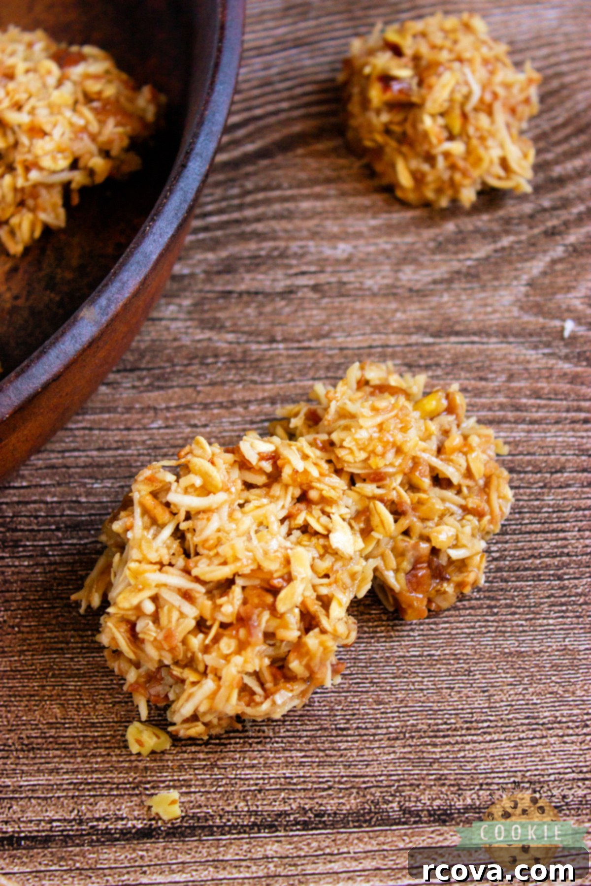 Golden Caramel Coconut No-Bake Delights 9 A collection of Caramel Coconut No-Bake Cookies, invitingly stacked, emphasizing their homemade goodness and ease of preparation.