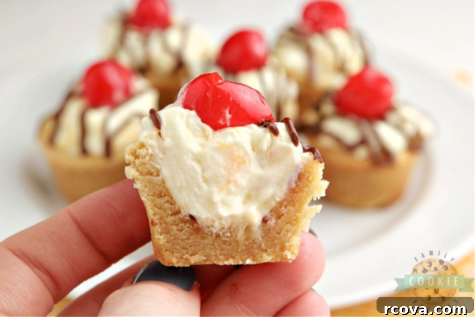 Banana Split Cookie Delights 5 A tray of beautifully arranged Banana Split Cookie Cups with glistening chocolate and cherries.