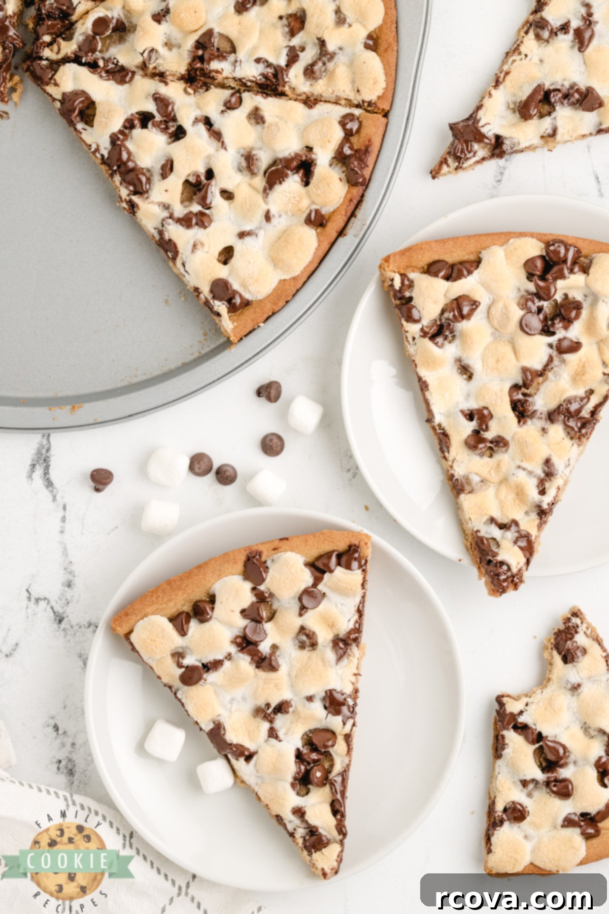 Giant Peanut Butter Cookie Pie 6 Peanut Butter Cookie Pizza is chewy, gooey, and loaded with marshmallows and chocolate. A fast, fun dessert everyone will love!