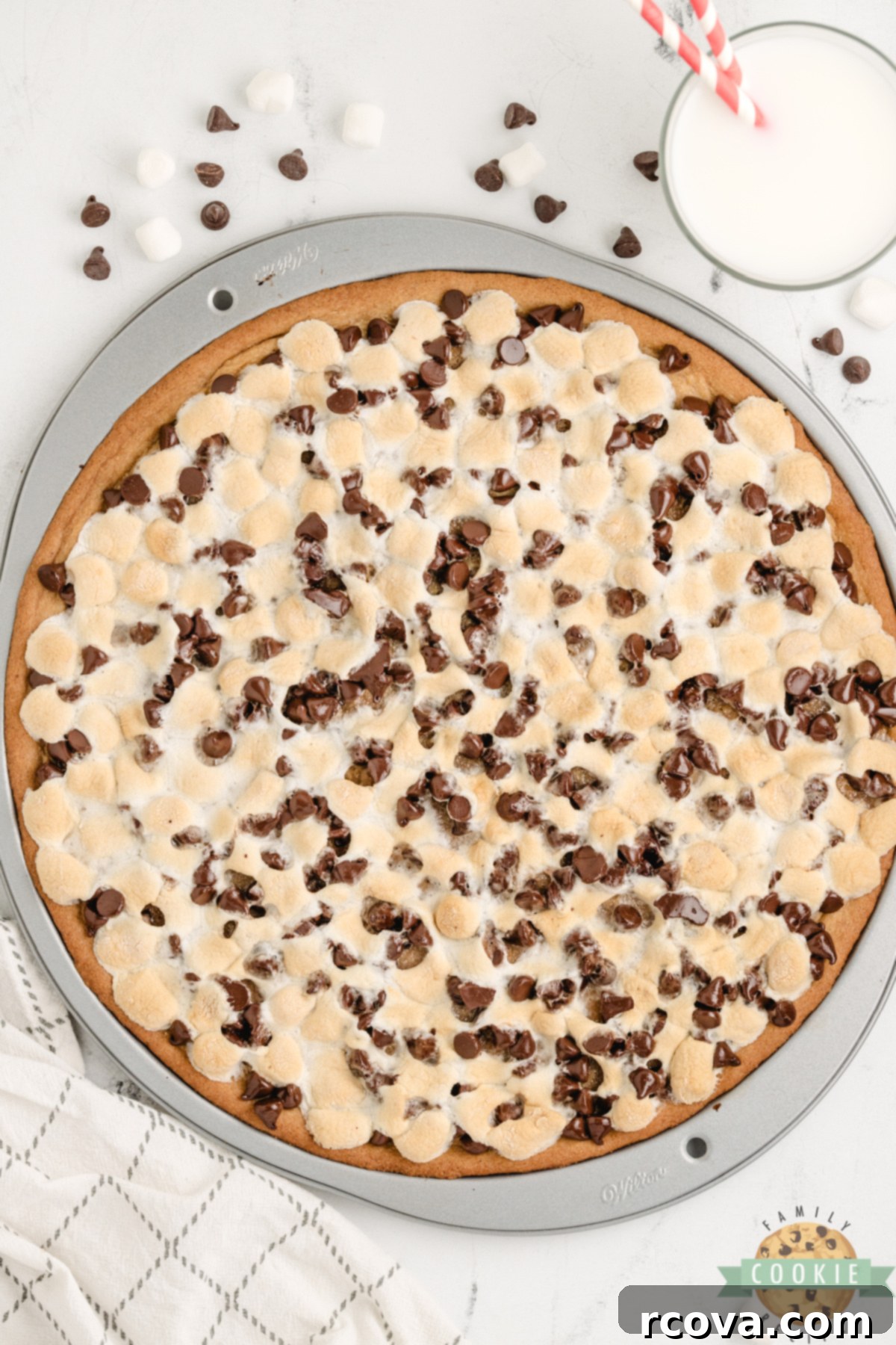 Giant Peanut Butter Cookie Pie 7 Peanut Butter Cookie Pizza is chewy, gooey, and loaded with marshmallows and chocolate. A fast, fun dessert everyone will love!