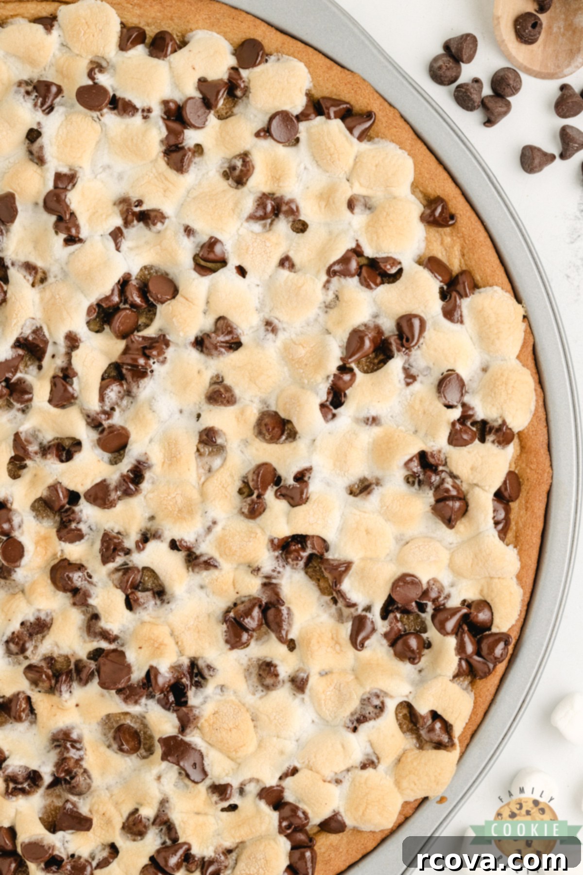 Giant Peanut Butter Cookie Pie 10 Peanut Butter Cookie Pizza is chewy, gooey, and loaded with marshmallows and chocolate. A fast, fun dessert everyone will love!