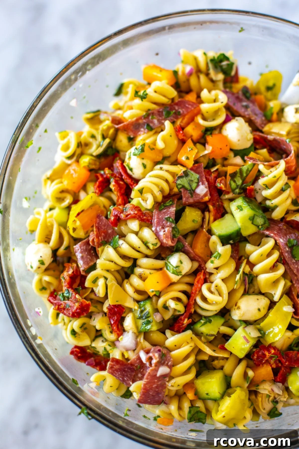 The Ultimate Italian Pasta Salad 7 A close-up of a big bowl filled with Italian pasta salad.