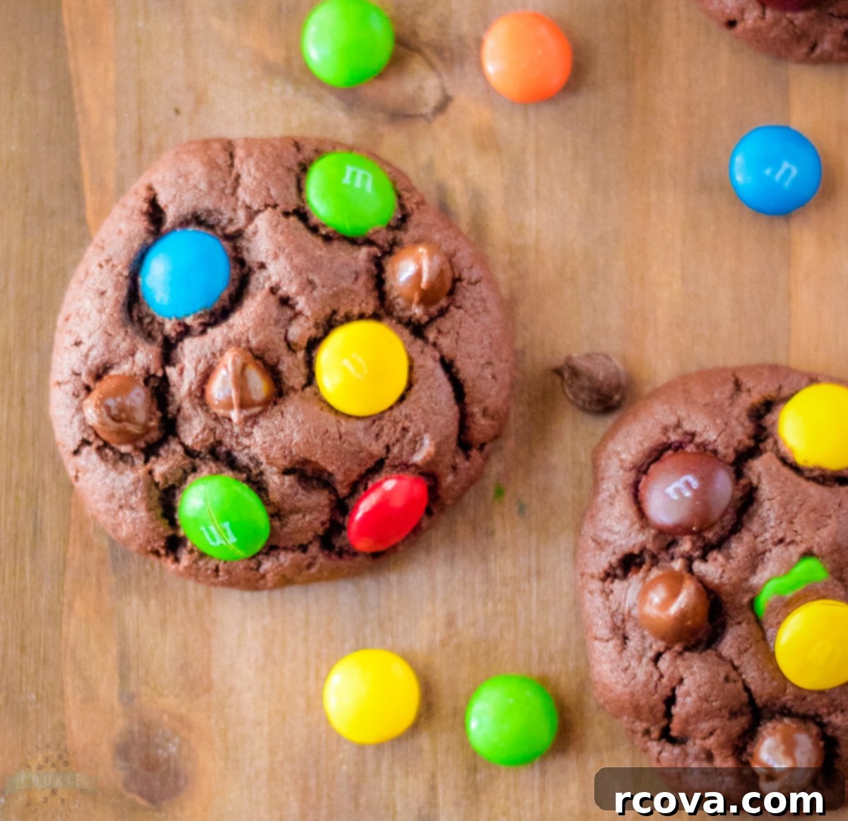 Ultimate Triple Chocolate M&M Cookies 2 Soft M&M Cookies with extra chocolate on a plate