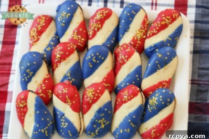 Effortless No-Bake Cookie Delights 19 Super Simple 4th of July Cookies: no-bake Milano cookies dipped in red and blue chocolate with gold stars.