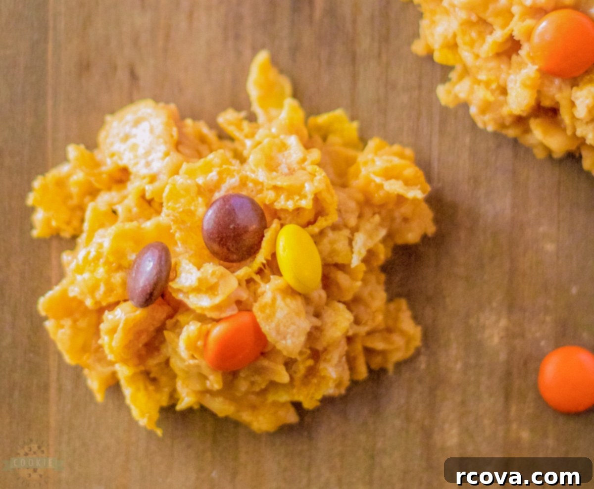Effortless No-Bake Cookie Delights 29 Cornflake no-bake cookies with Reese's Pieces candy on top, a fun and tasty treat.