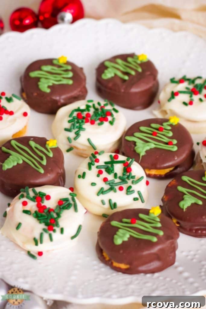 Effortless No-Bake Cookie Delights 31 Chocolate Covered Ritz Crackers decorated with peanut butter and festive sprinkles.