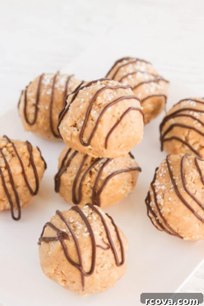 Effortless No-Bake Cookie Delights 9 No-Bake Muddy Buddy Protein Cookies with chocolate and peanut butter coating.