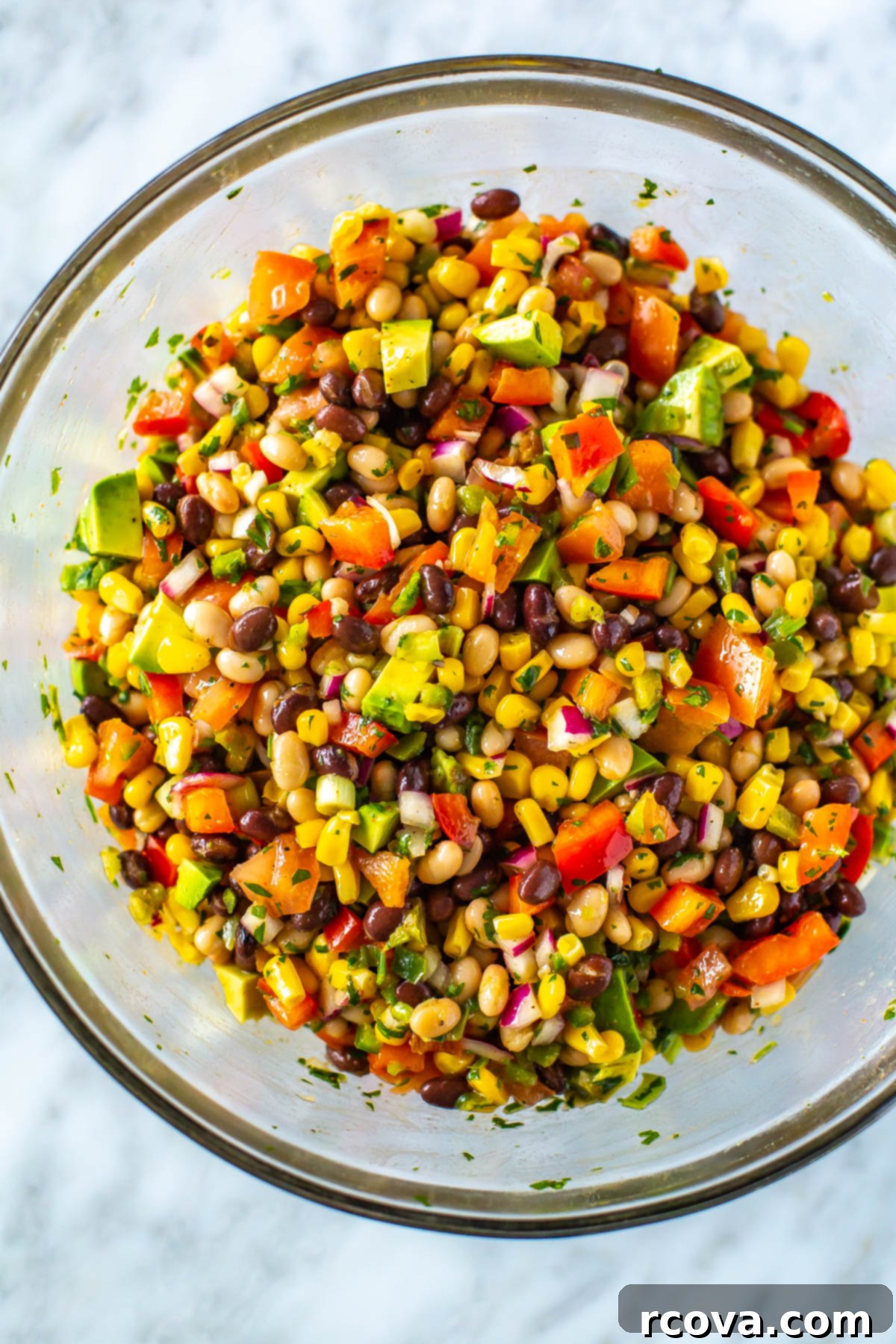 The Only Cowboy Caviar Recipe You'll Ever Need 7 A close-up of a bowl of cowboy caviar, highlighting its vibrant colors and textures.