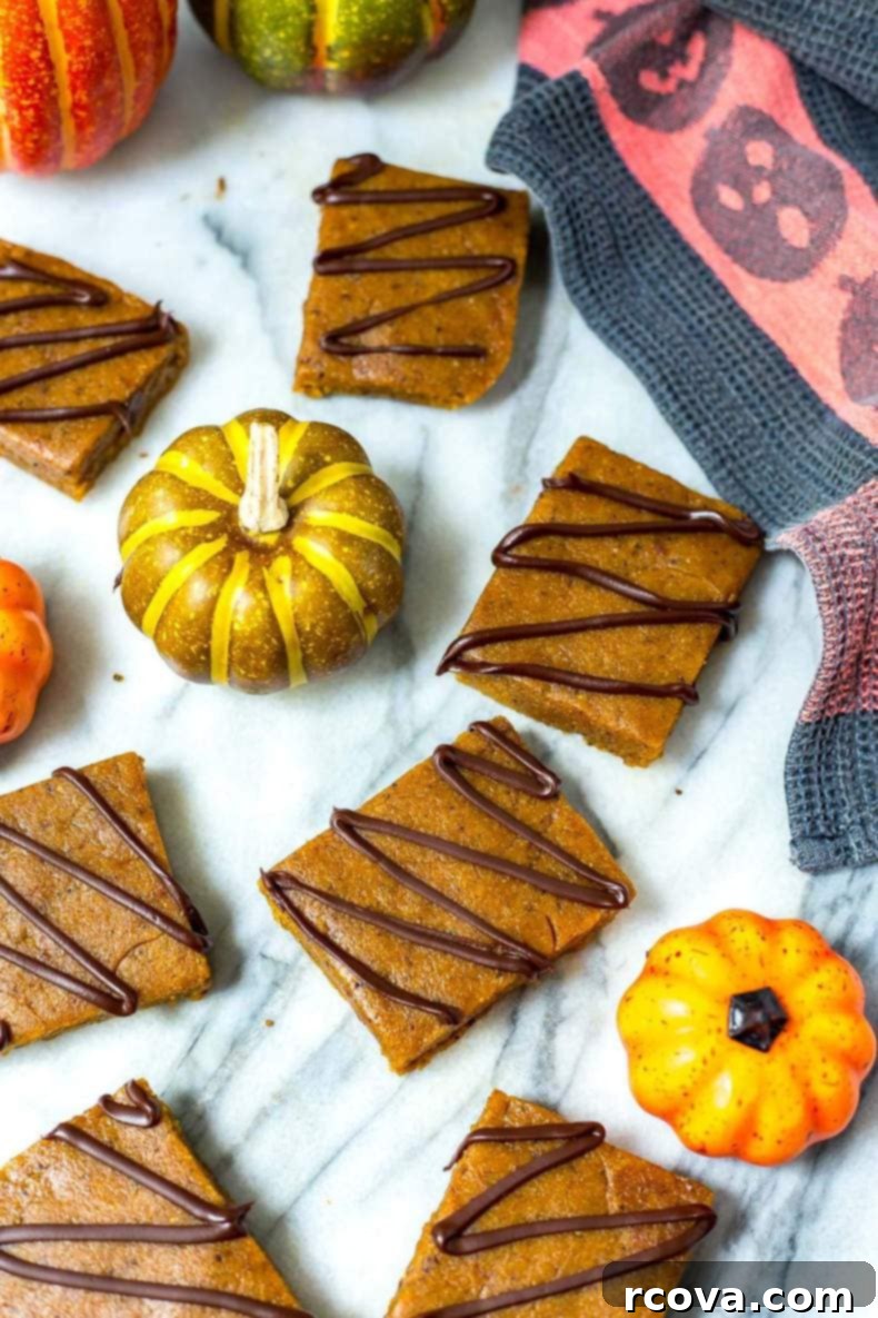 15 Power-Packed Protein Snacks 13 Pumpkin spice latte protein bars on a cooling rack, a perfect healthy fall snack.