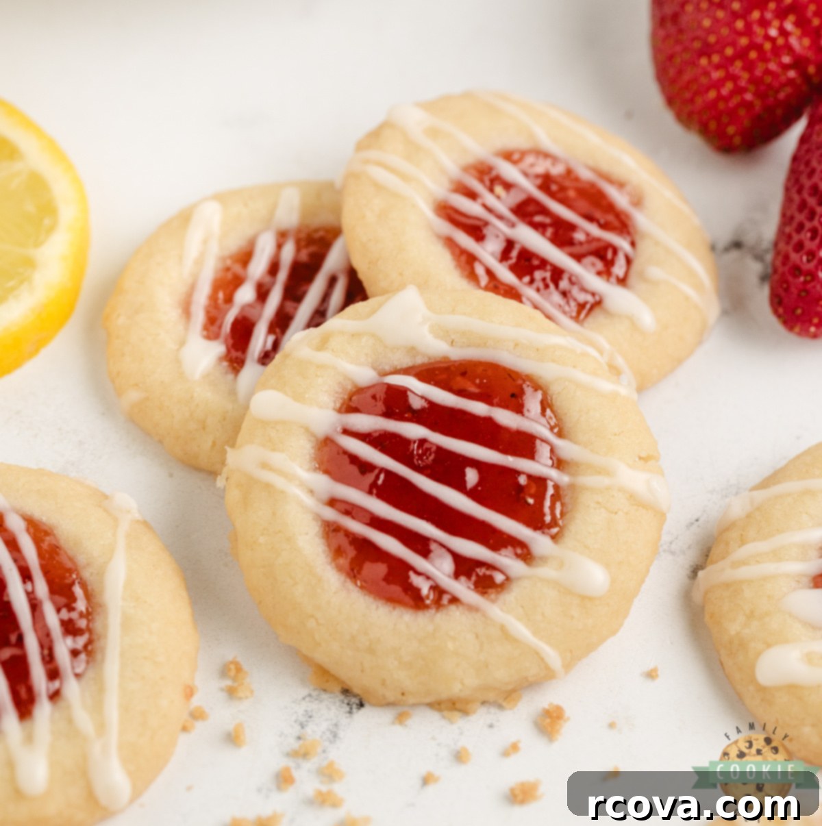 Strawberry Lemon Drop Cookies 2 Delicious Strawberry Lemon Thumbprint Cookies are buttery, citrusy, and sweet—filled with jam and topped with a tangy lemon glaze!