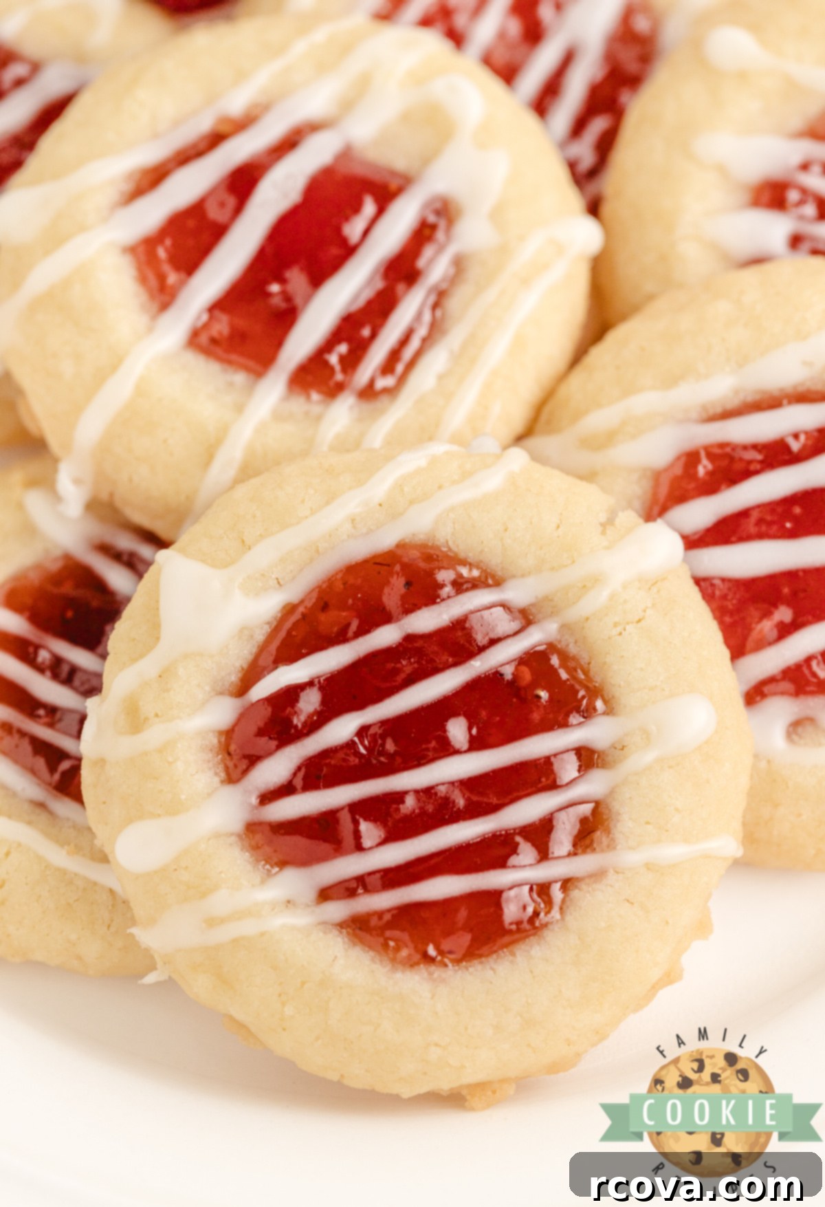 Strawberry Lemon Drop Cookies 8 A close-up shot of a single Strawberry Lemon Thumbprint Cookie, highlighting its textures and appealing colors.