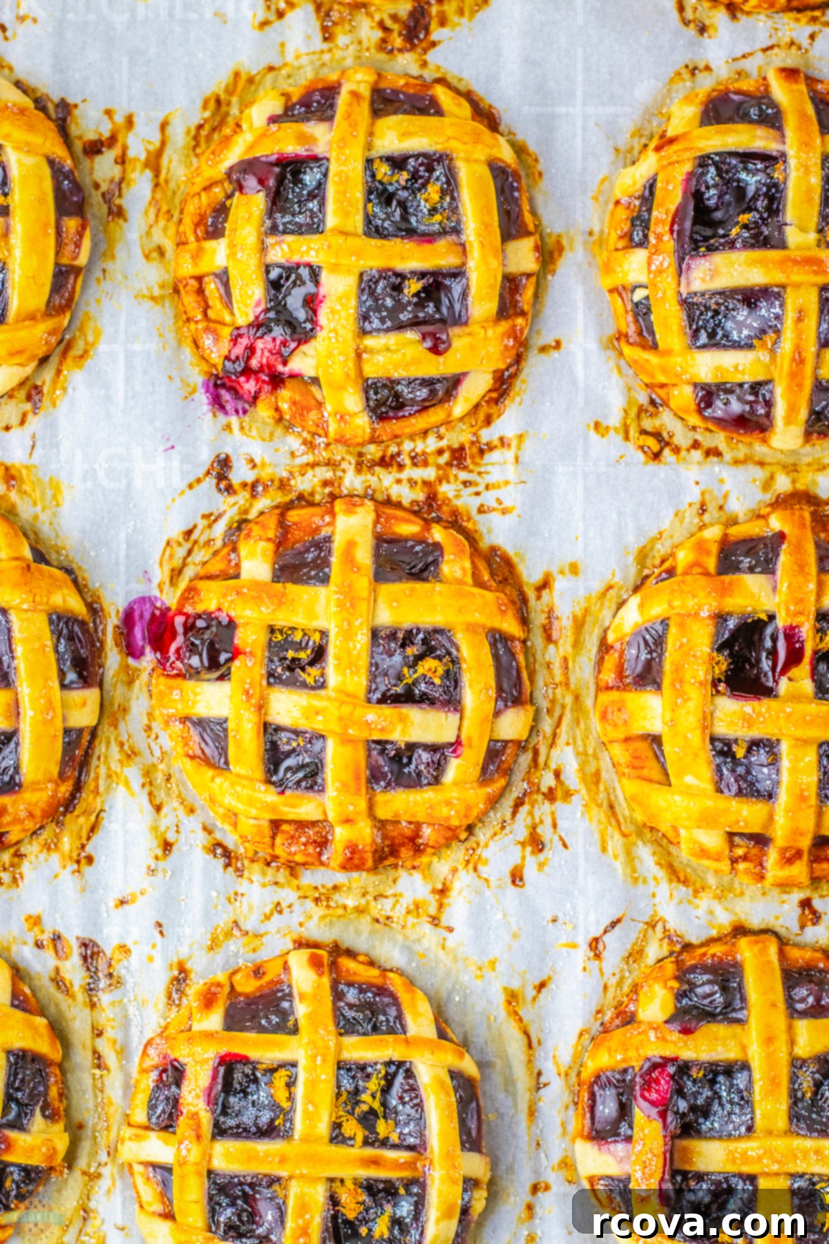 Sunshine Berry Cookie Pies 5 blueberry pie cookies on a baking sheet