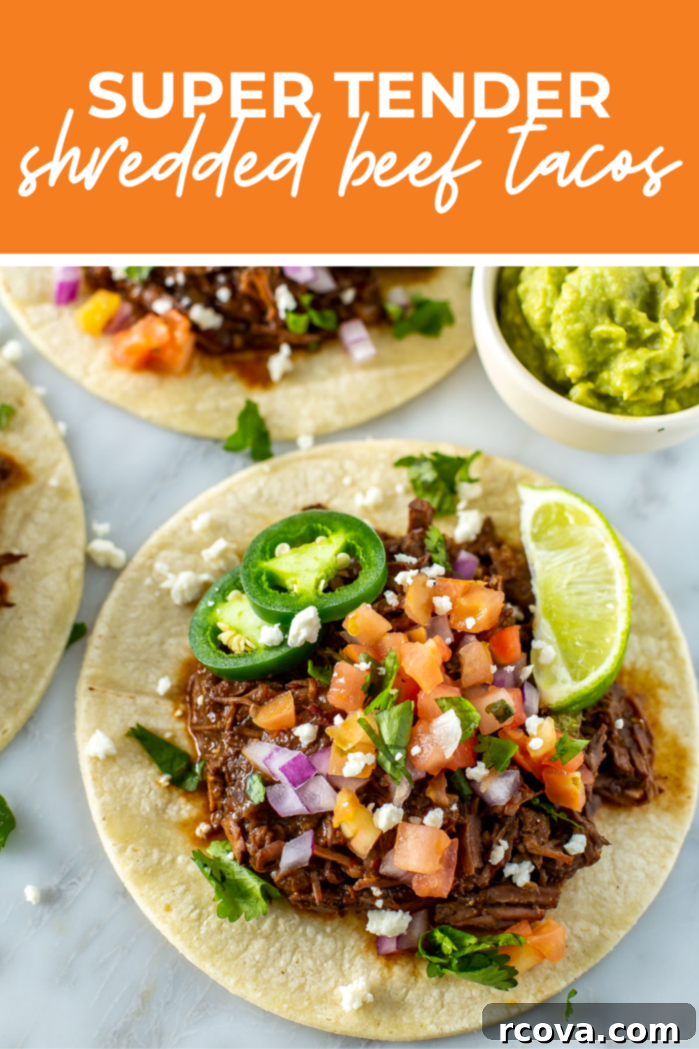 Crockpot Stovetop or Instant Pot Shredded Beef Tacos 13 overhead shot of plated dish with orange banner on the top- reading "super tender shredded beef tacos"