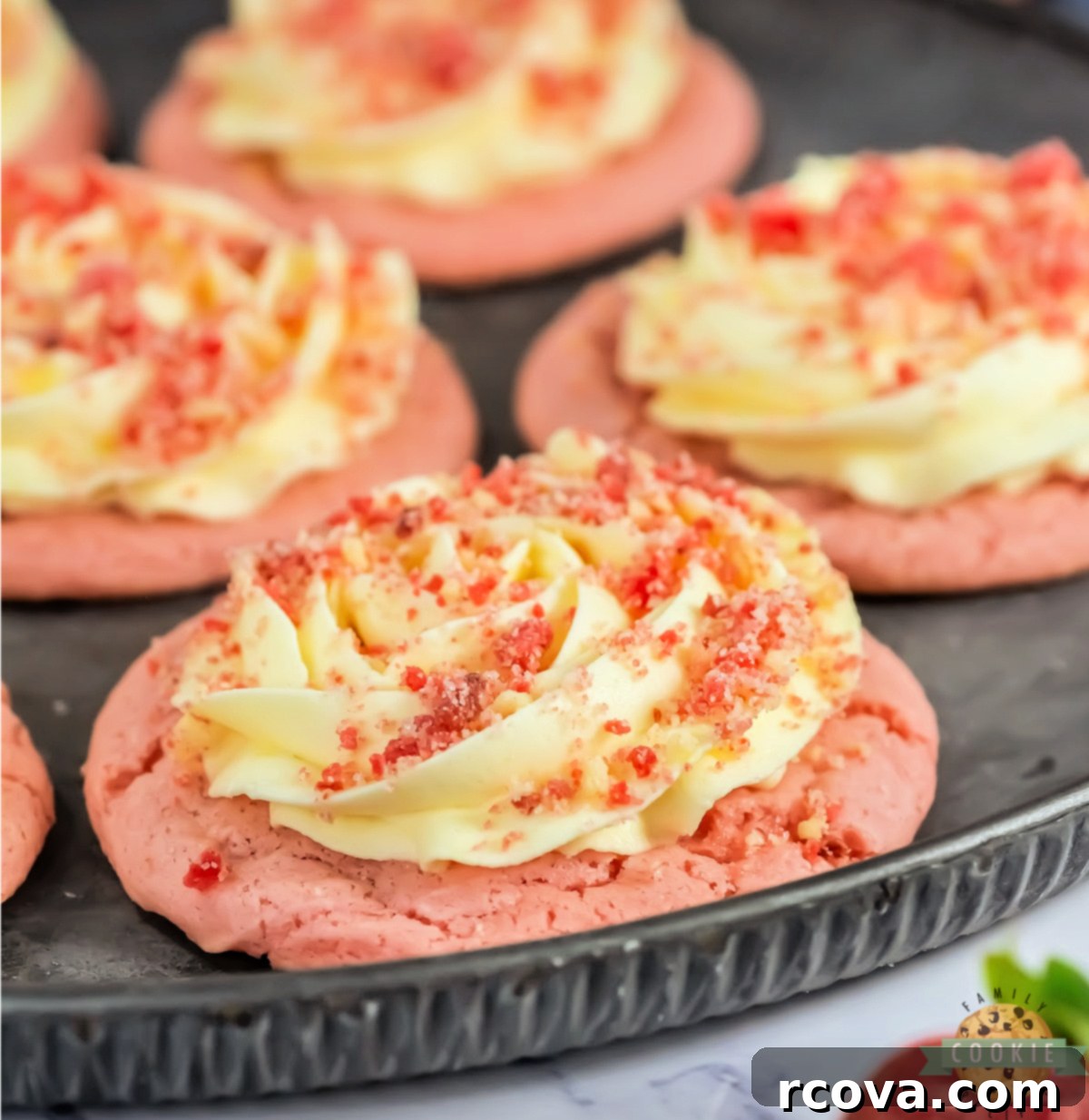 Bakery Style Strawberry Shortcake Cookies 2 Homemade Copycat Crumbl Strawberry Shortcake Cookies with a soft cake mix base, creamy vanilla frosting, and crunchy strawberry streusel topping. These sweet, vibrant cookies are a perfect bakery-style treat.